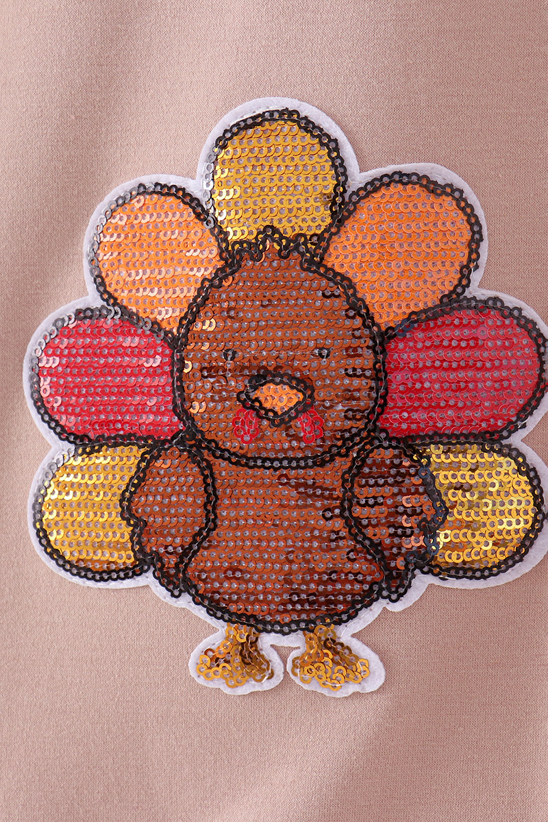 Khaki turkey sequin mom top